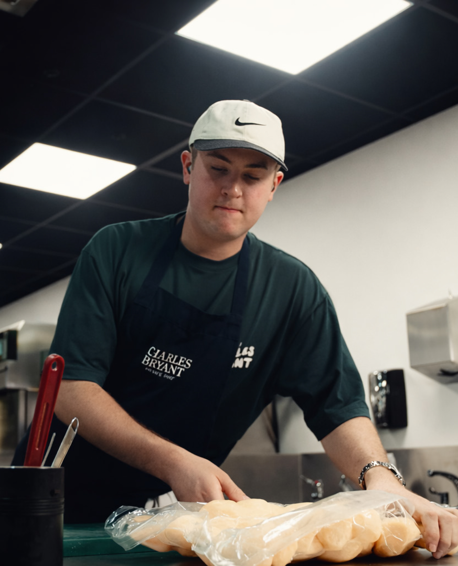 Charles Bryant cooking in kitchen